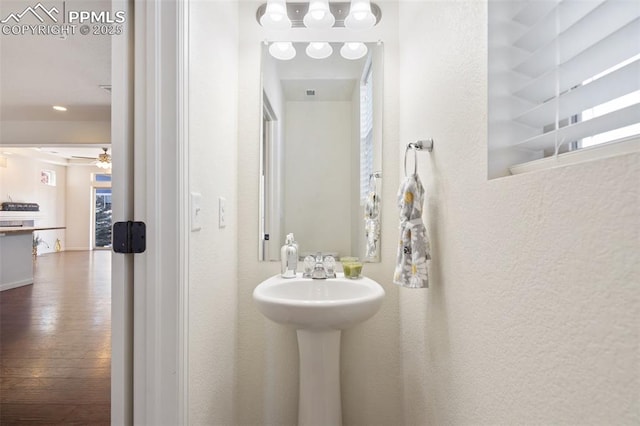 bathroom with ceiling fan