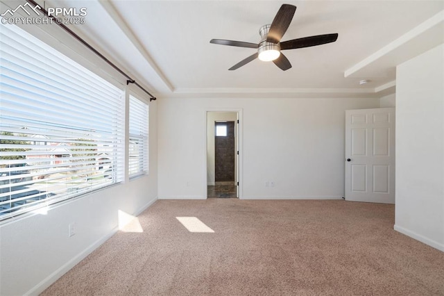 spare room with ceiling fan and carpet flooring