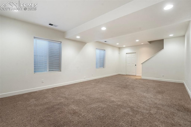 spare room featuring carpet flooring