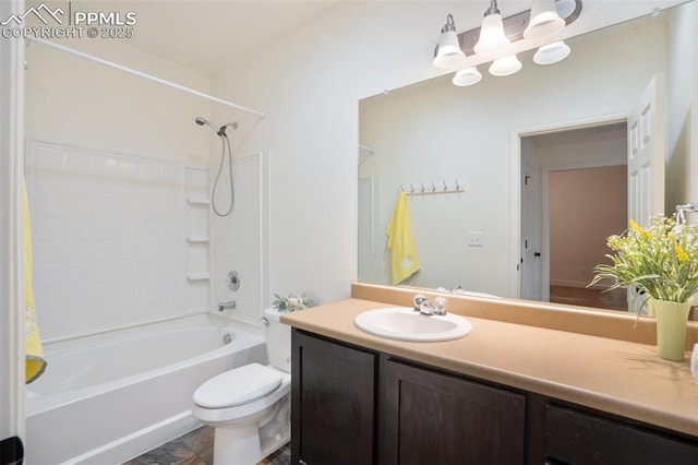 full bathroom featuring toilet, vanity, and shower / bathing tub combination