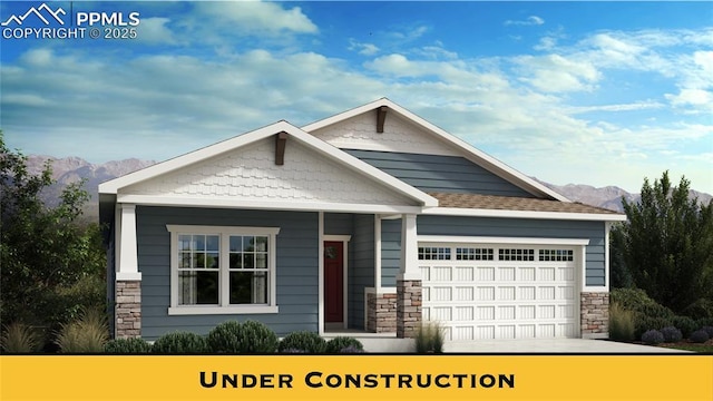 craftsman house with a mountain view and a garage