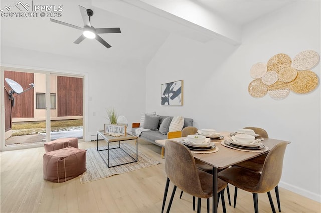 dining room with lofted ceiling with beams, ceiling fan, and light hardwood / wood-style floors