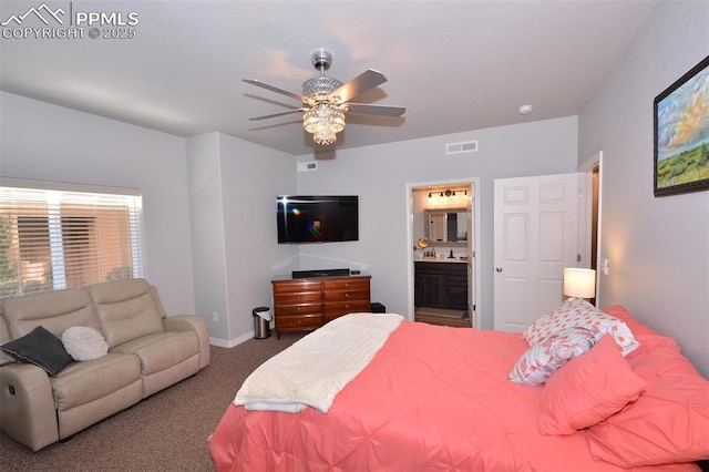 carpeted bedroom featuring ceiling fan and ensuite bath