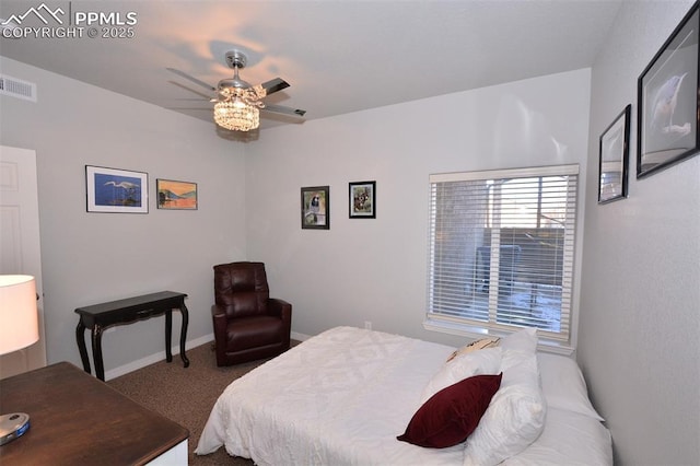 bedroom featuring ceiling fan and carpet