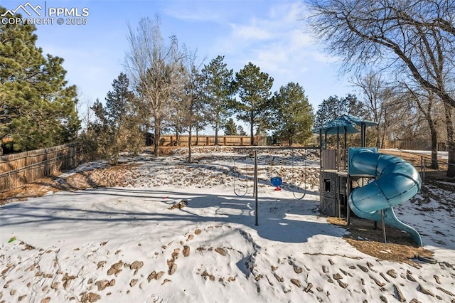 view of snow covered playground