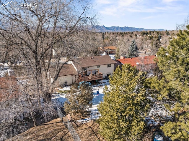 birds eye view of property featuring a mountain view