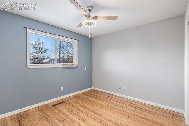 unfurnished room featuring ceiling fan and light hardwood / wood-style floors