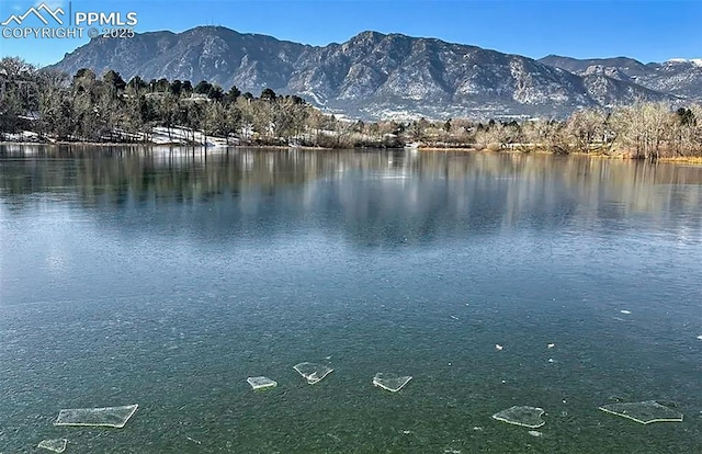 property view of water featuring a mountain view