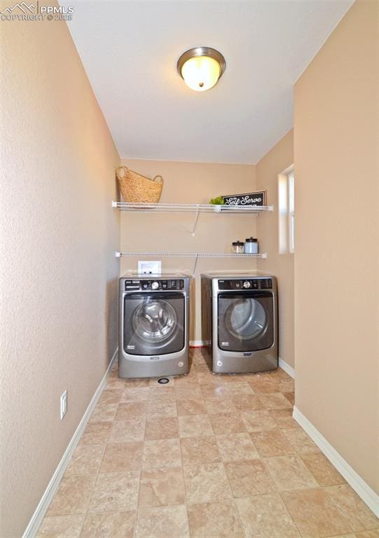 washroom featuring separate washer and dryer