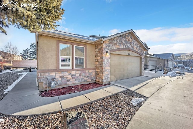 single story home featuring a garage