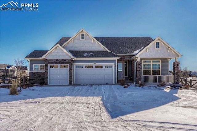 craftsman-style house featuring a garage and covered porch