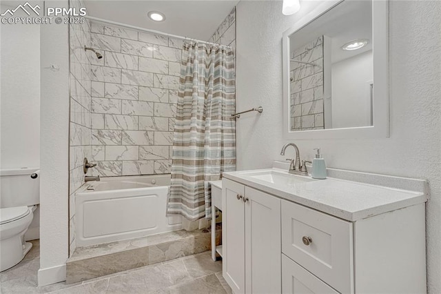 full bathroom with vanity, toilet, and shower / bath combo with shower curtain