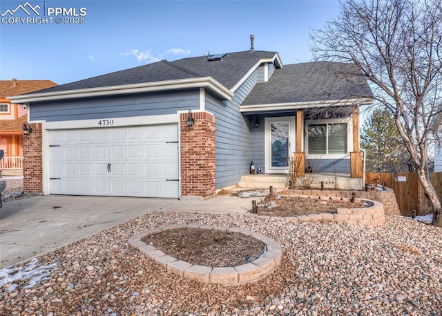 ranch-style house featuring a garage