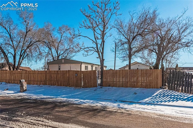 view of yard covered in snow