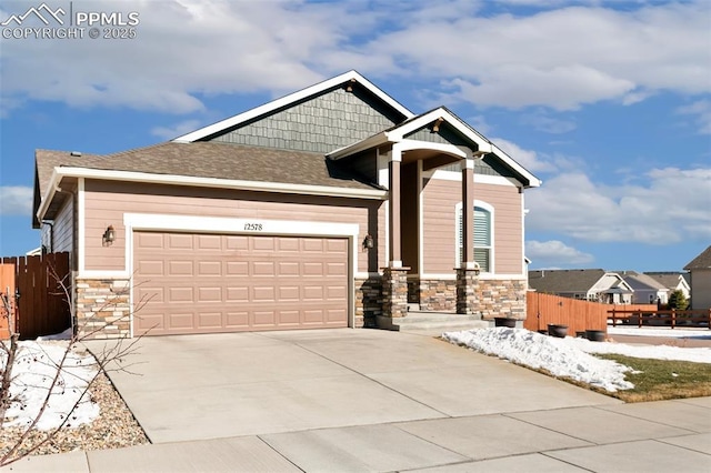 craftsman inspired home featuring a garage