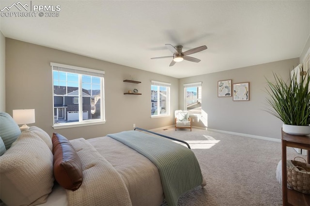 bedroom featuring ceiling fan and carpet floors