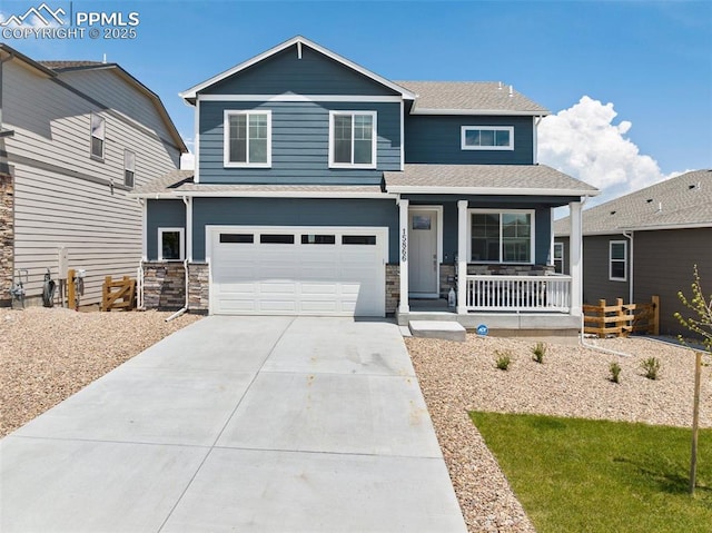 craftsman inspired home featuring a garage and a porch