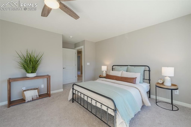 bedroom with ceiling fan and light colored carpet