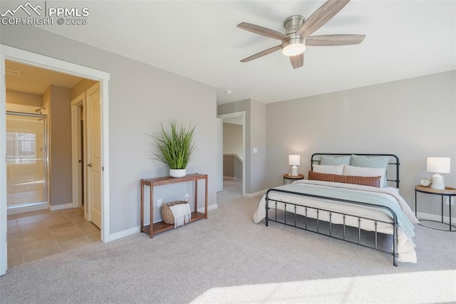 carpeted bedroom featuring ceiling fan and ensuite bathroom