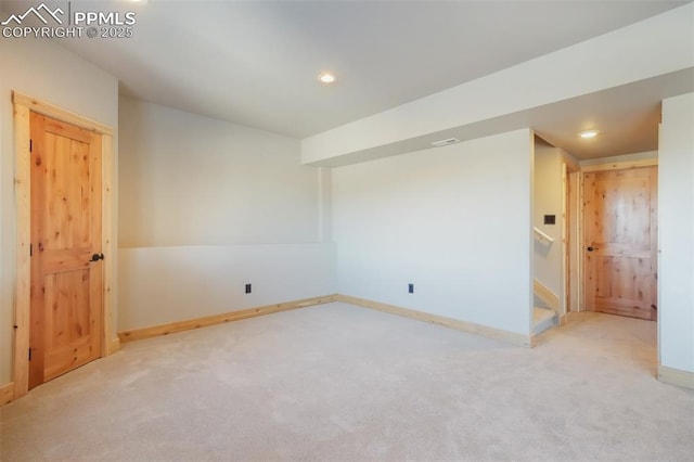 spare room with carpet floors