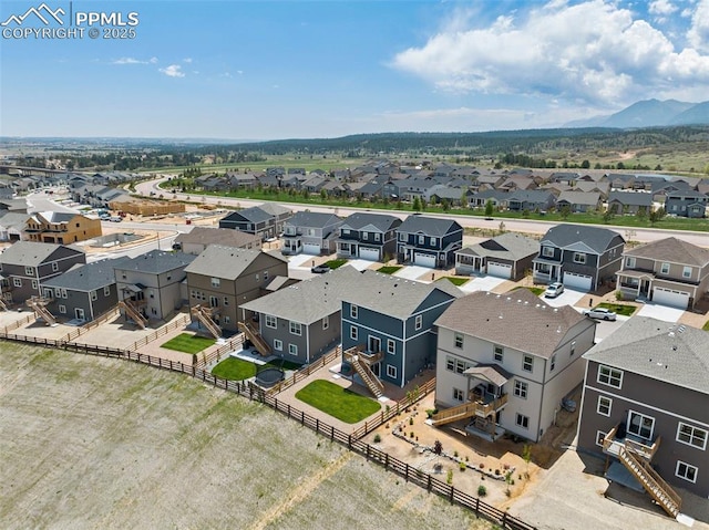 drone / aerial view featuring a mountain view