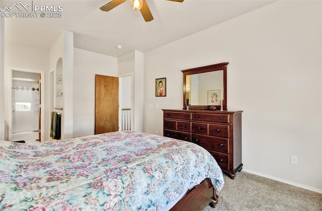 bedroom with ceiling fan and light carpet