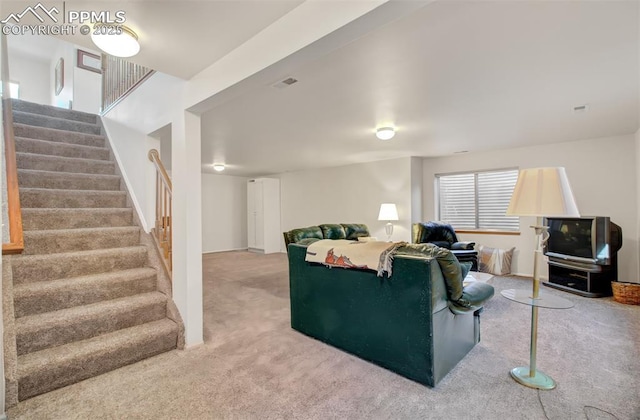 living room featuring carpet