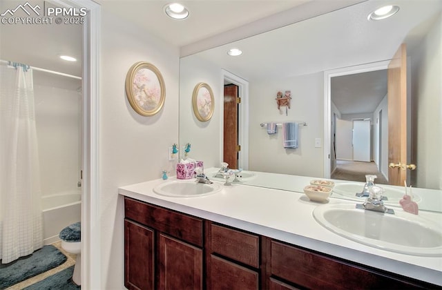 full bathroom featuring vanity, toilet, and shower / bath combo