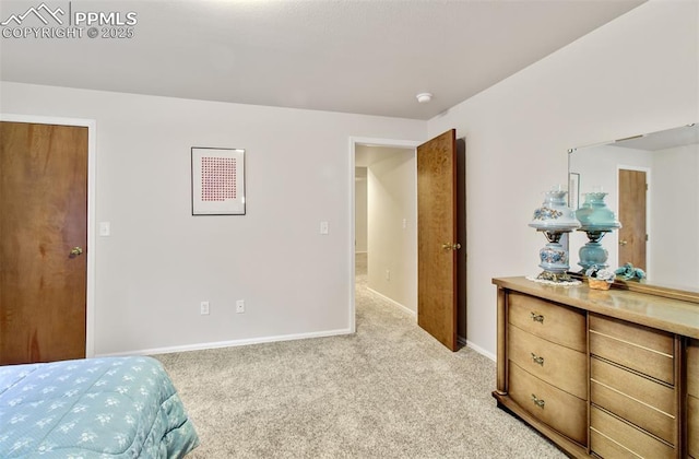 bedroom with light colored carpet