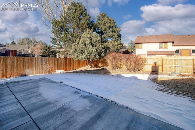 view of snow covered pool