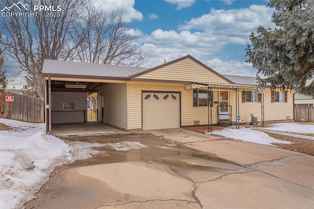 single story home with a garage and a carport