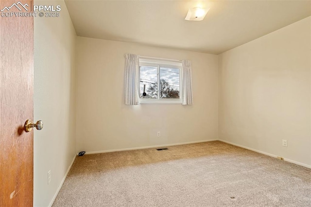 view of carpeted spare room