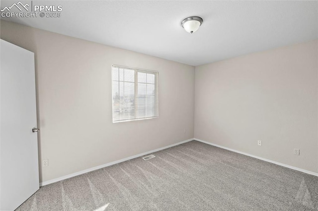 view of carpeted spare room