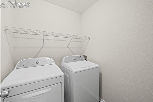 laundry area featuring separate washer and dryer