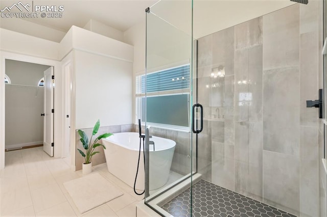 bathroom with tile patterned floors and plus walk in shower