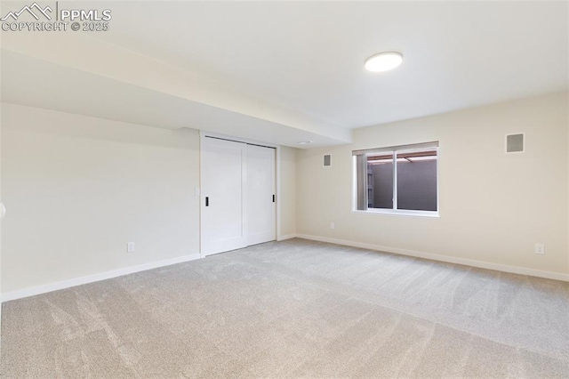 unfurnished bedroom featuring a closet and carpet floors