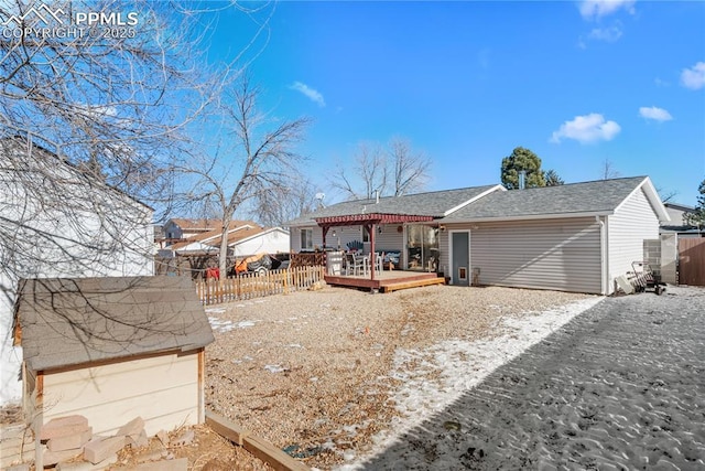 view of front of property featuring a wooden deck