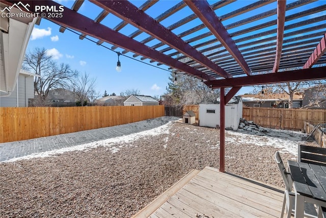 exterior space featuring a storage shed and a pergola