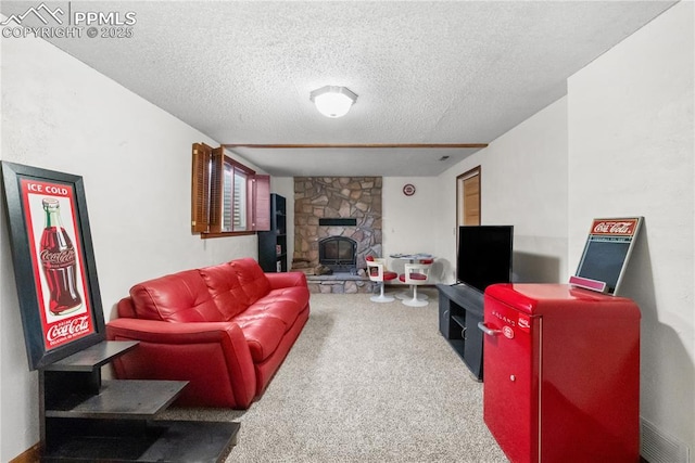 living room with a textured ceiling, carpet flooring, and a fireplace