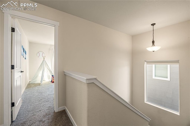 corridor featuring carpet