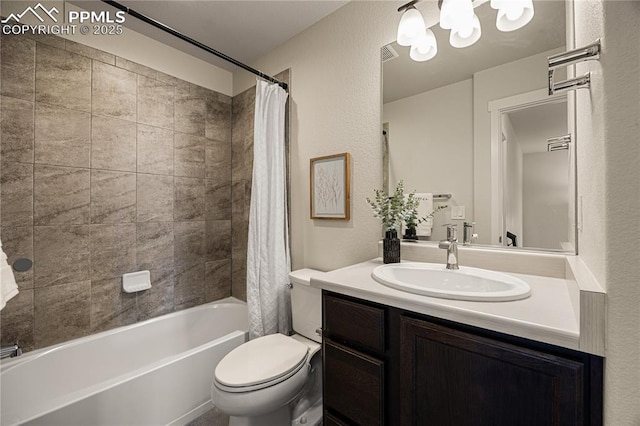 full bathroom featuring shower / bath combo with shower curtain, toilet, and vanity