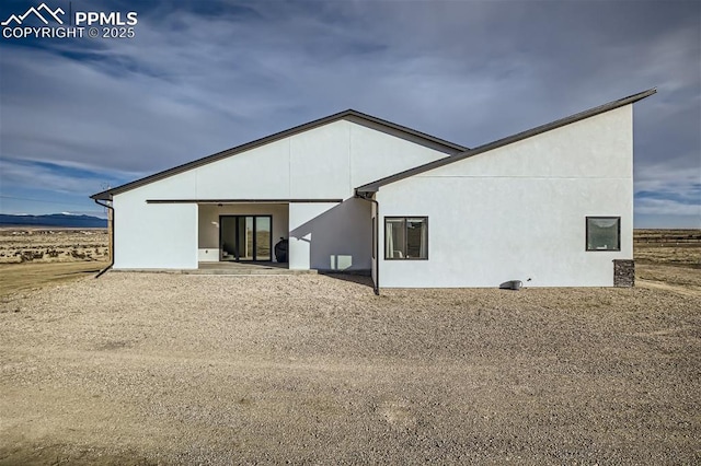 rear view of house with a patio area