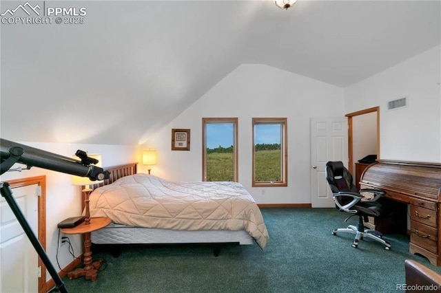 bedroom with lofted ceiling and carpet flooring