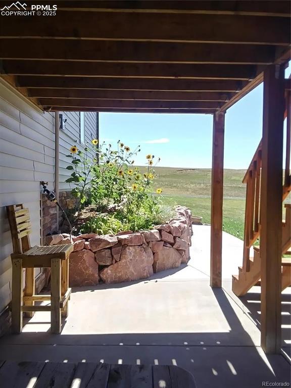 view of patio featuring a wooden deck