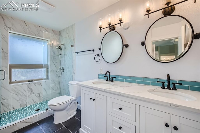 bathroom featuring tile patterned floors, an enclosed shower, vanity, and toilet