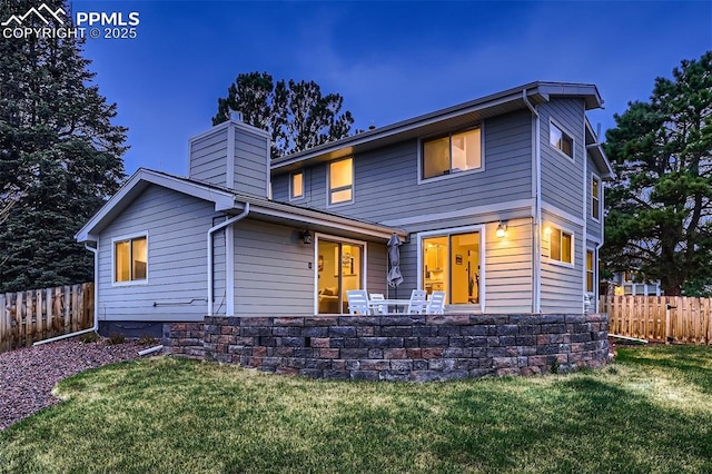 view of front of home with a front yard