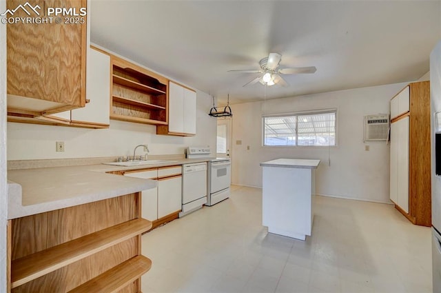 kitchen featuring sink, white cabinetry, ceiling fan, stove, and white dishwasher