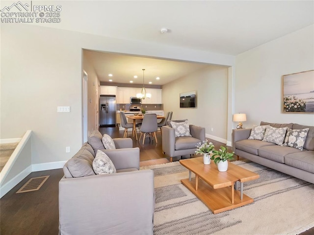 living room with hardwood / wood-style floors