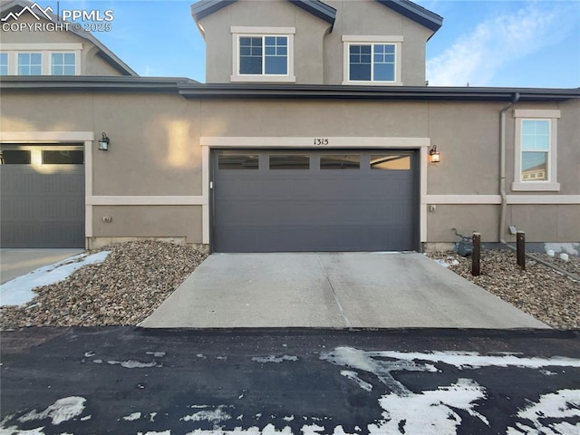 view of front of property with a garage