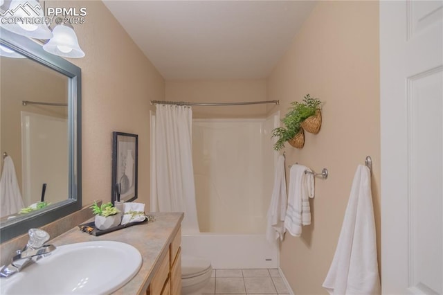 full bathroom with tile patterned floors, vanity, toilet, and shower / bath combination with curtain